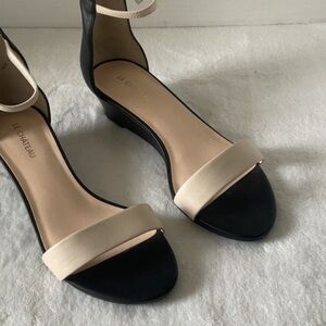 Le Chateau Black and Cream Wedge Sandals